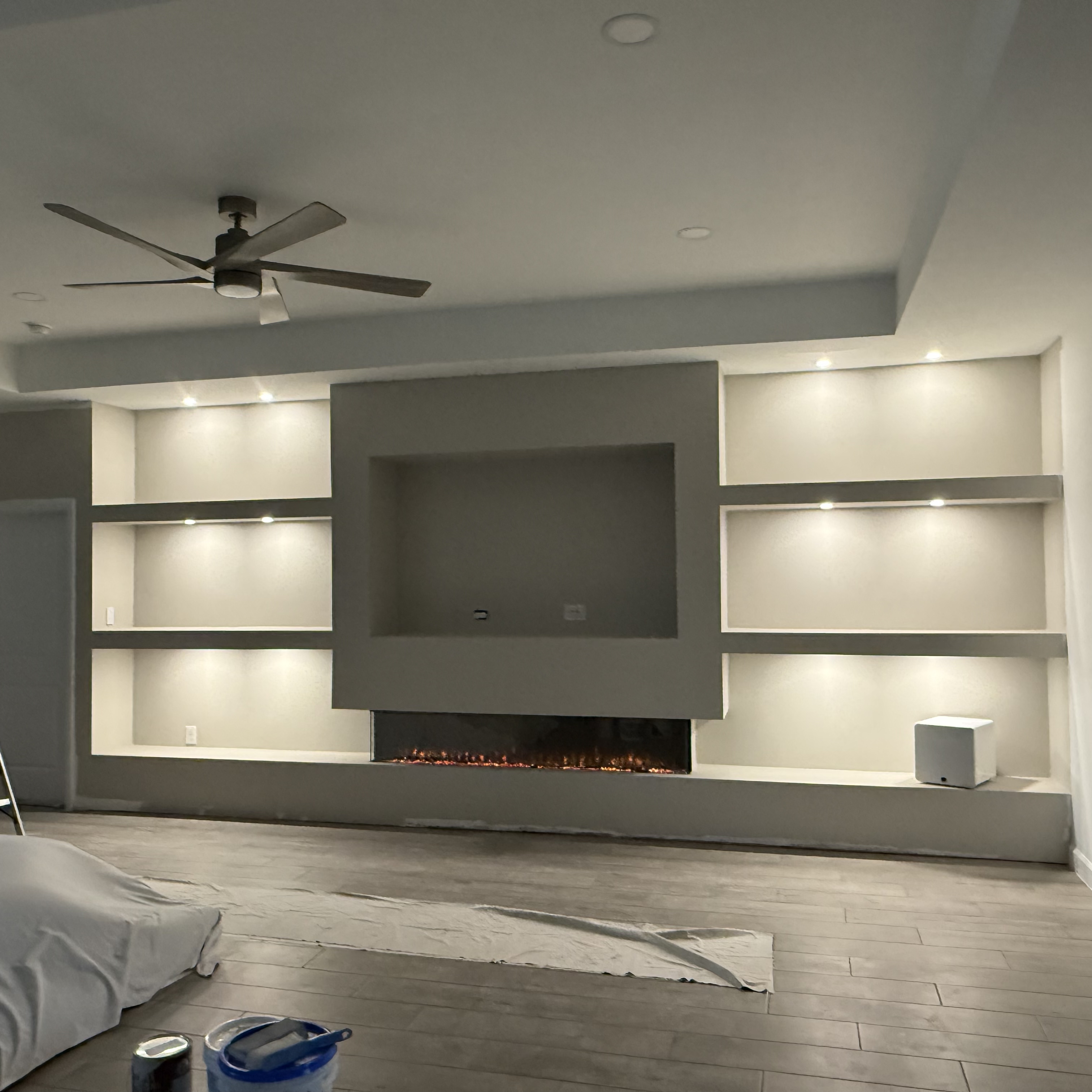 Entertainment wall construction showing custom built-in framework
