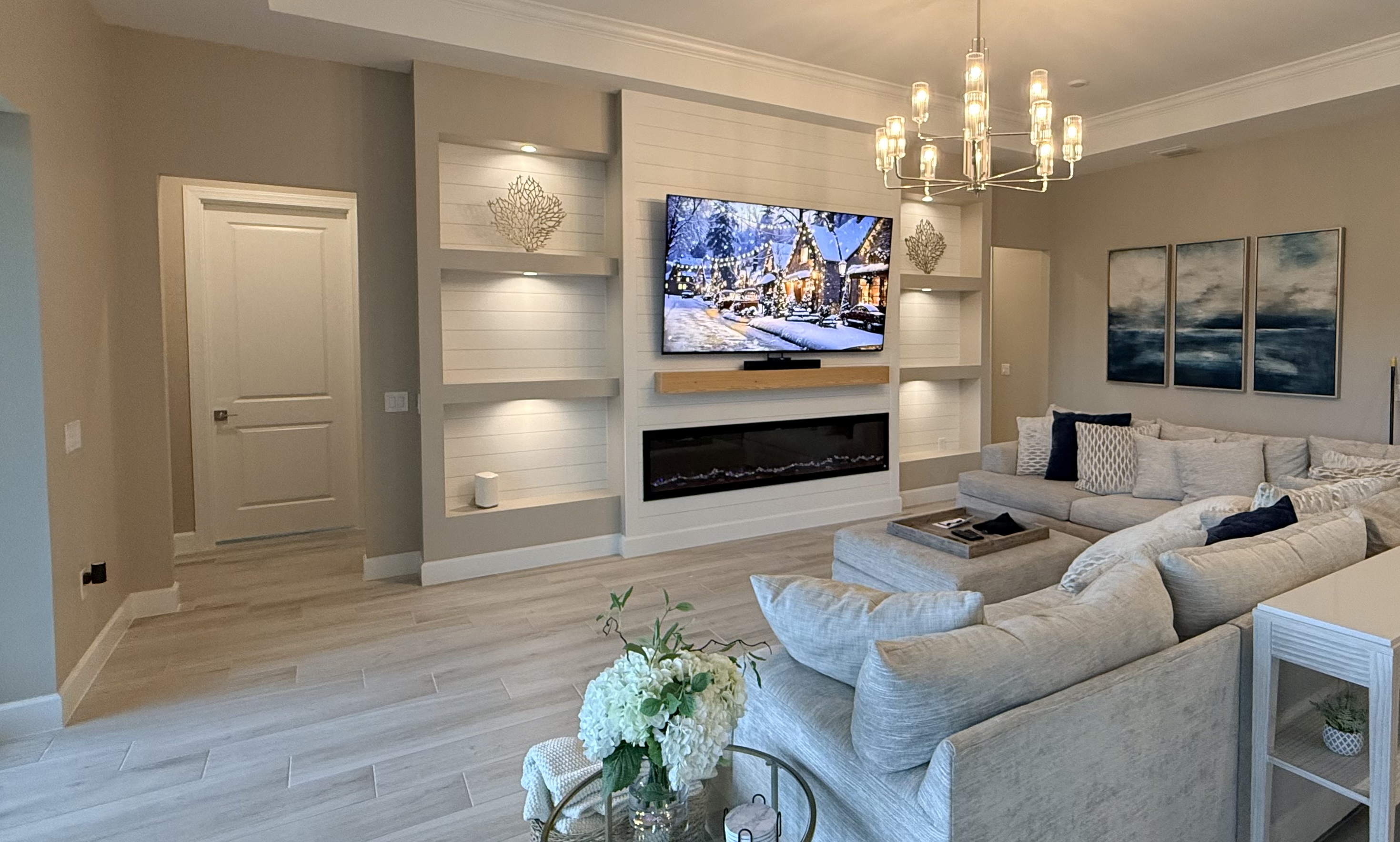 Entertainment wall with shiplap accent and floating TV mount