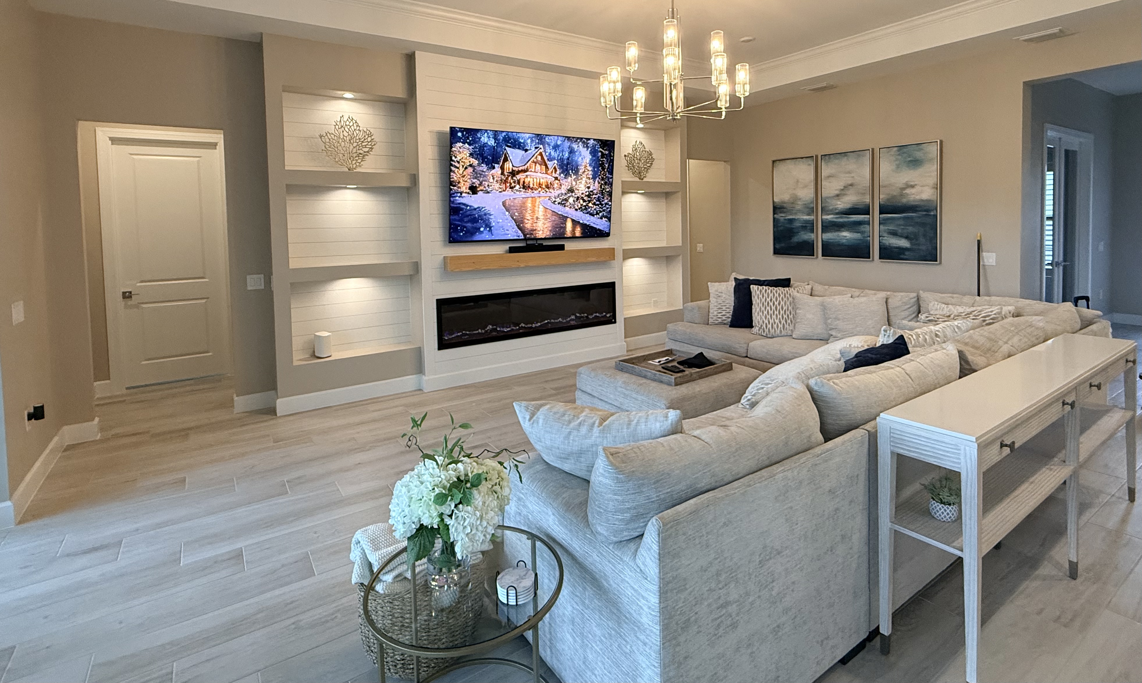 Luxury entertainment center with custom millwork and ambient lighting