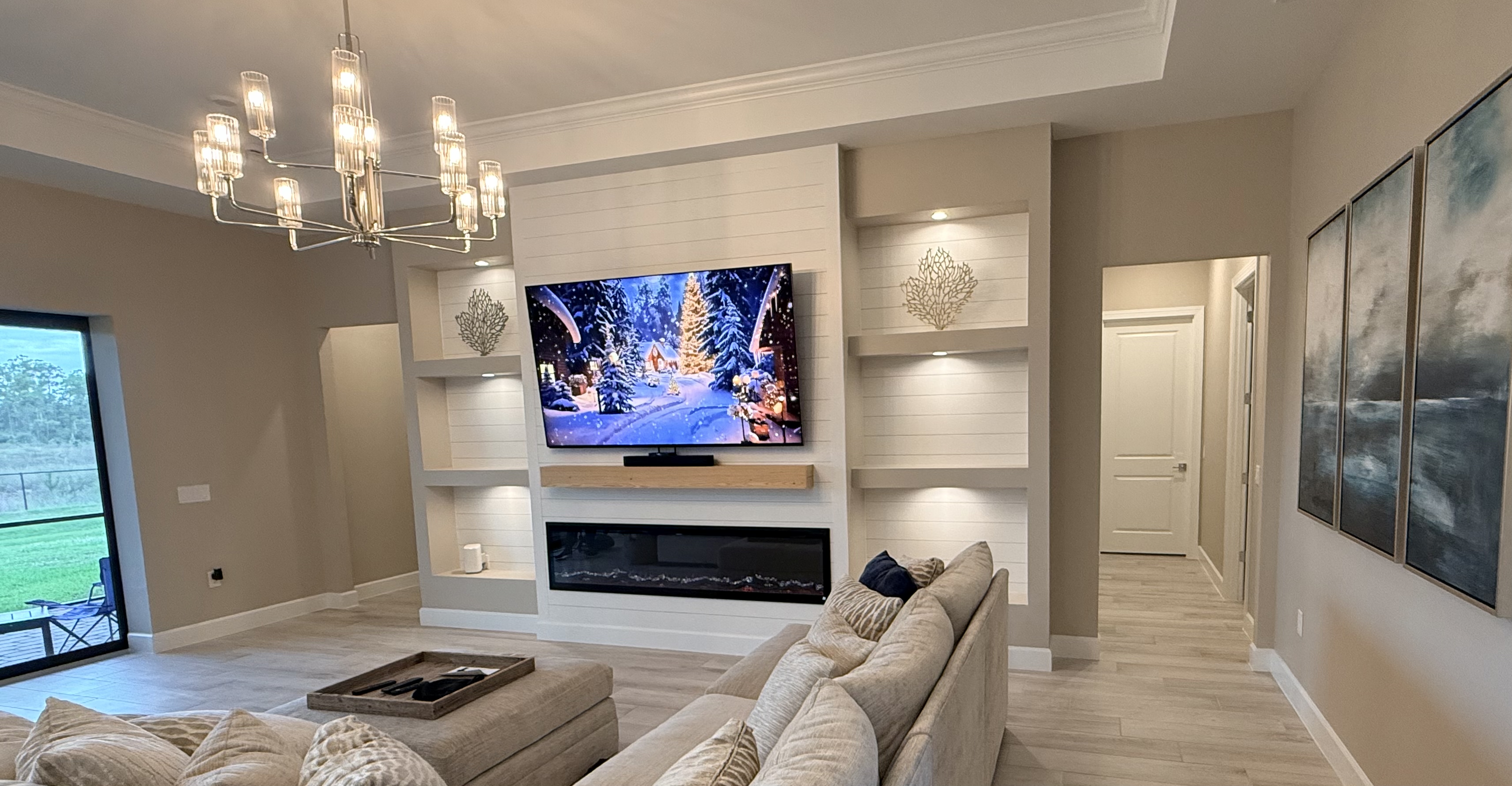 Modern entertainment wall with integrated fireplace and shelving